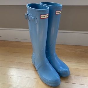 Tall blue hunter boots